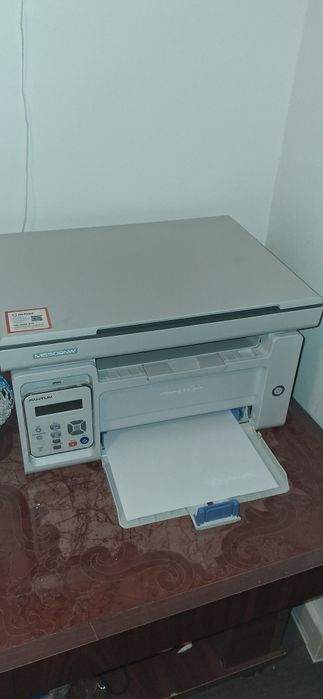 Imprimantă multifunctionala laser