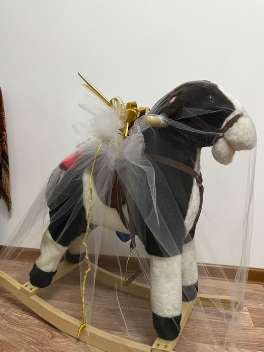 Игрушка конь качалка