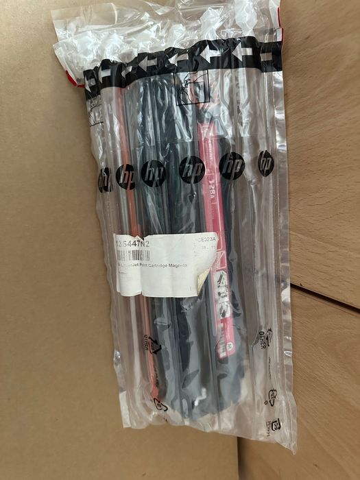 cartus laser HP 128A CE323A magenta NOU original made in Japan predare sau livrare Bucuresti 1 bucata disponibila la pret competitiv