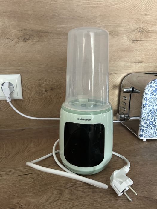 Уред за преваряване или топлене на бебешко мляко/храна