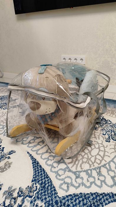 Детская игрушка качели