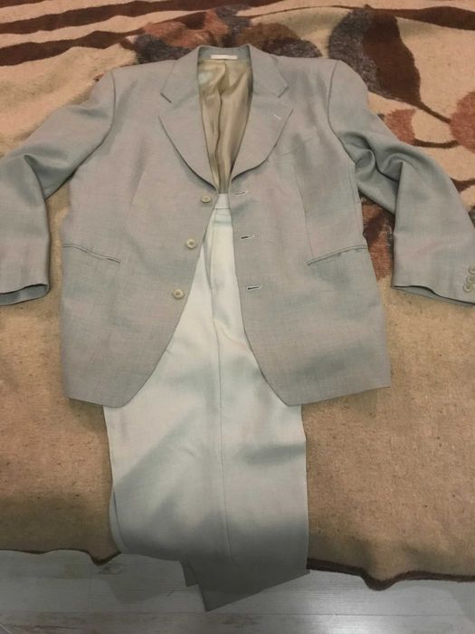 Продавам  костюм - сако и панталон размер 52/176