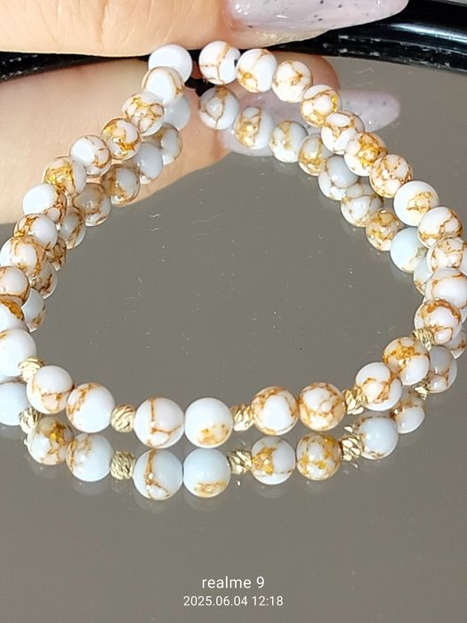 Brățări cu biluțe din aur