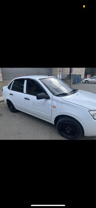 Машина Лада Гранта.Газ-бензин