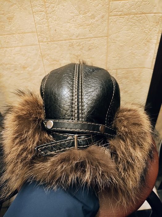 Продам шапку из енота