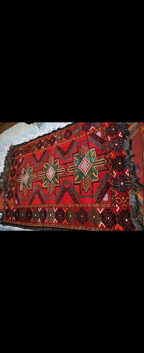 Қолдан тоқылған қазақы кілем