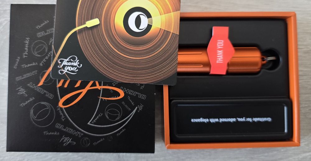 Lanterna breloc Olight pumpkin orange, 180 lumen