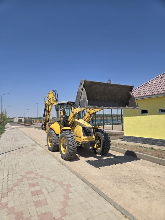 Услуги экскаватора погрузчика гидромолот