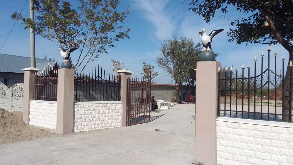 Vultur din beton/ornamente stalpi gard