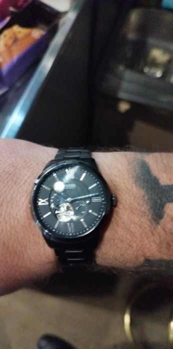 FOSSIL Часовника е в отлично състояние