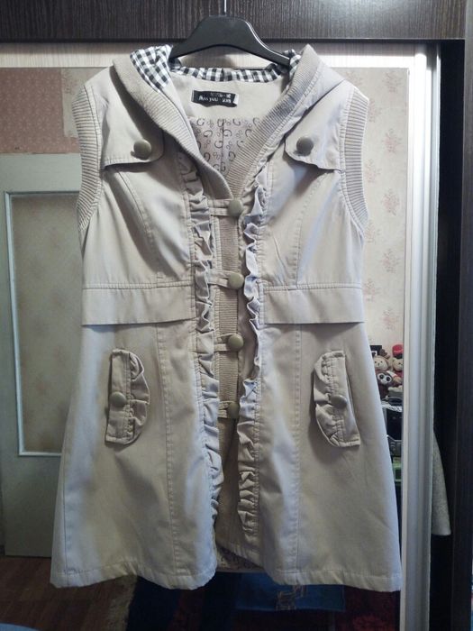 Женская жилетка.