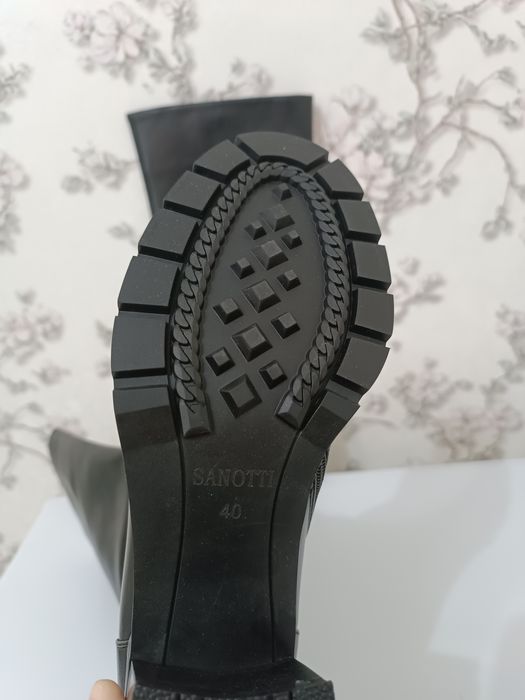 Продам новые сапоги