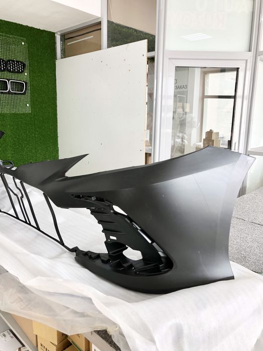 Передний бампер Камри 75