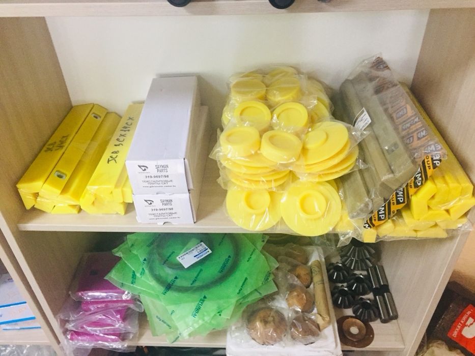 Тексталитовые пластины на экскаватор-погрузчик