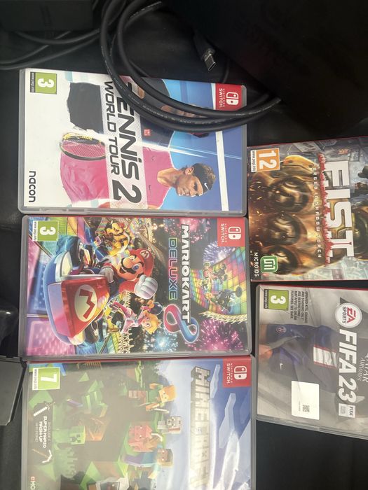 Nintendo switch, допълнителен джойстик и 5 игри