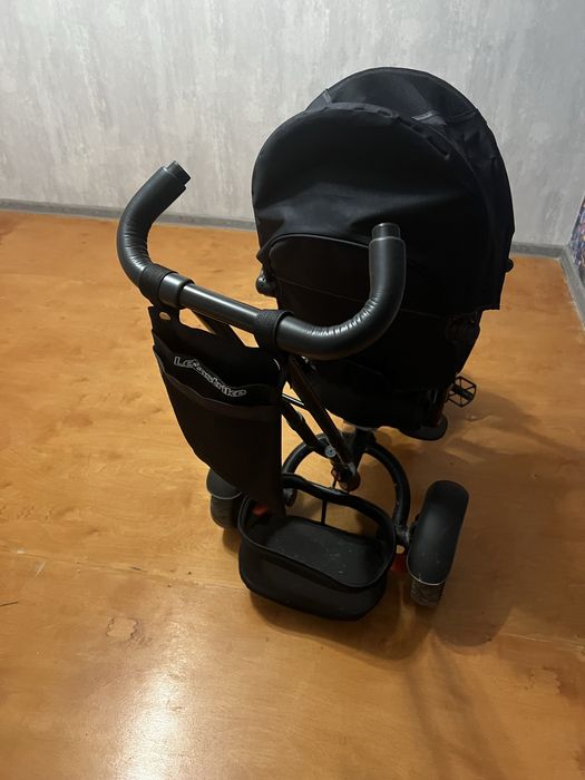 Трехколесный велосипед Lexustrike с ручкой и козырьком