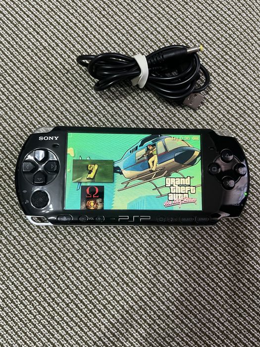 Psp  3000 modat cu card de 64gb