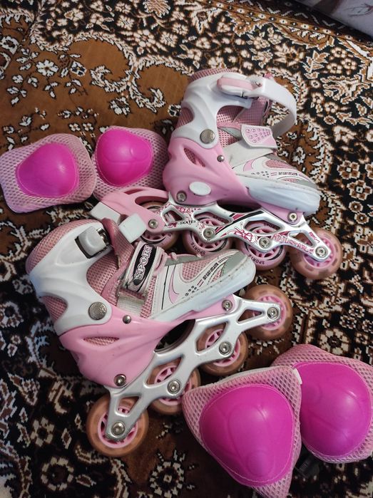 Продам роликовые коньки