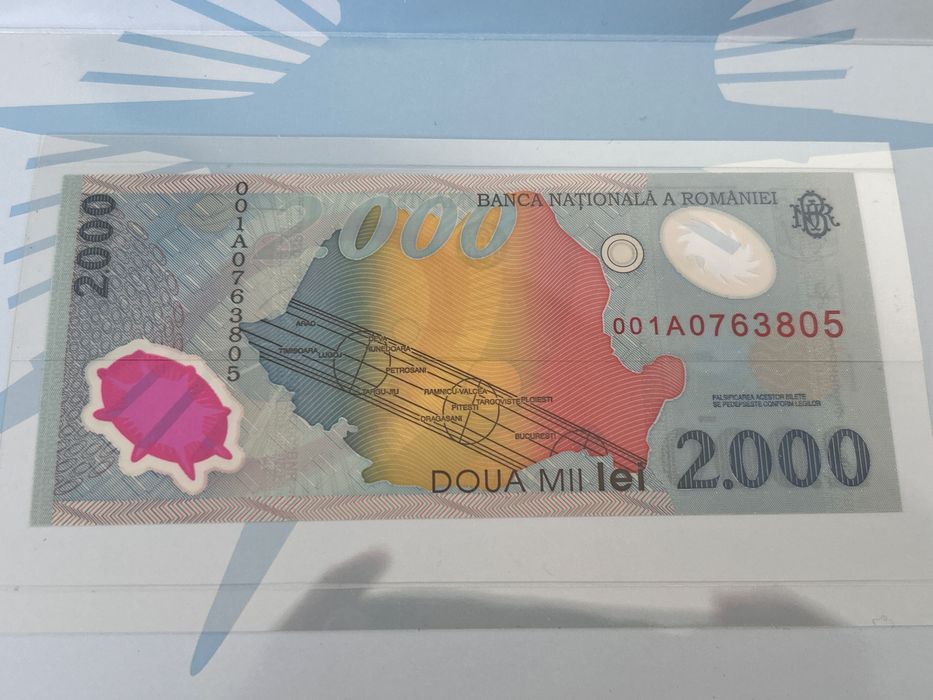 Bancnota 2000 lei eclipsa 1999