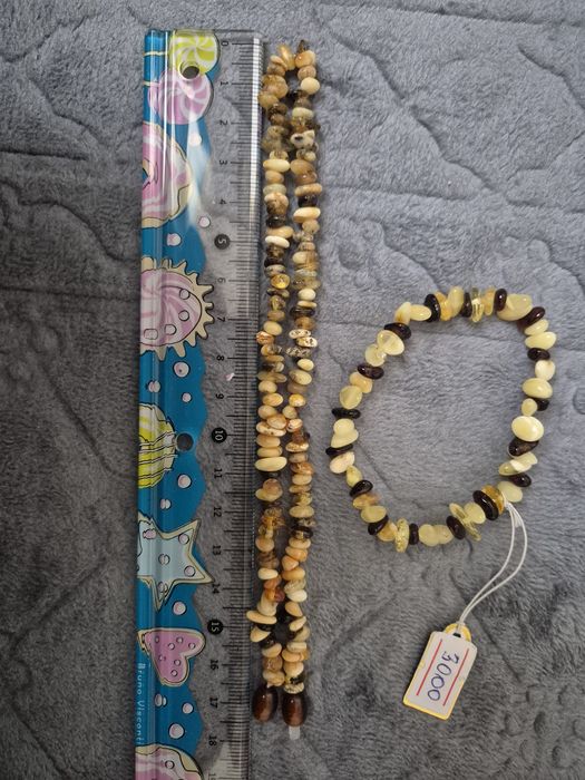 Продам  натуральные янтарные бусы