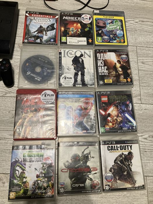 Продам Playstation 3 super slim + 12 игр +2 джостика