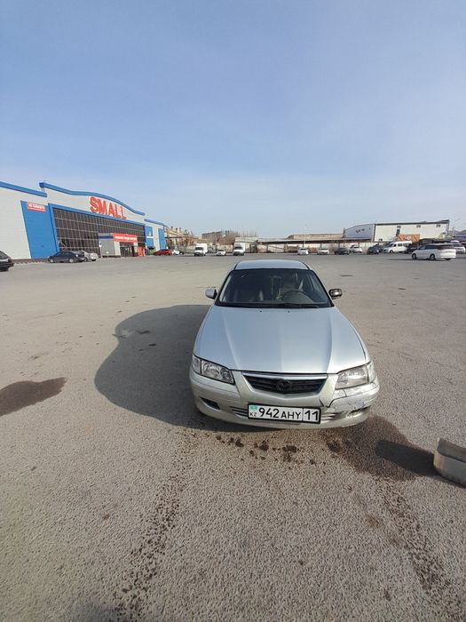 Мазда 626 птичка