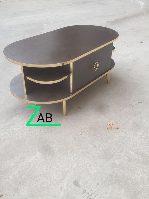 Овальный журнальный чайний столик  прекрасно впишется в любой интерьер