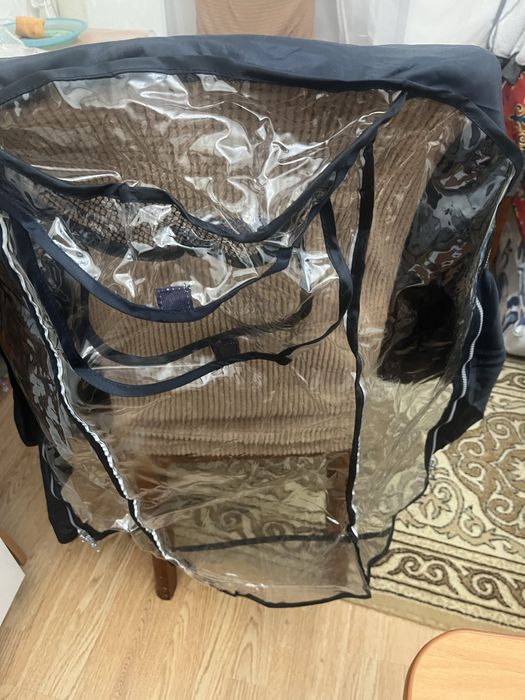 Дождевик и подставка для ног на коляску