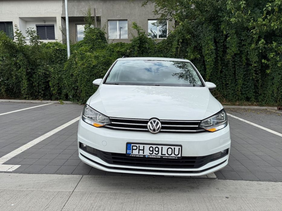 Volkswagen Touran Prim propietar cu verificare la reprezentanta km reali masina de Direc