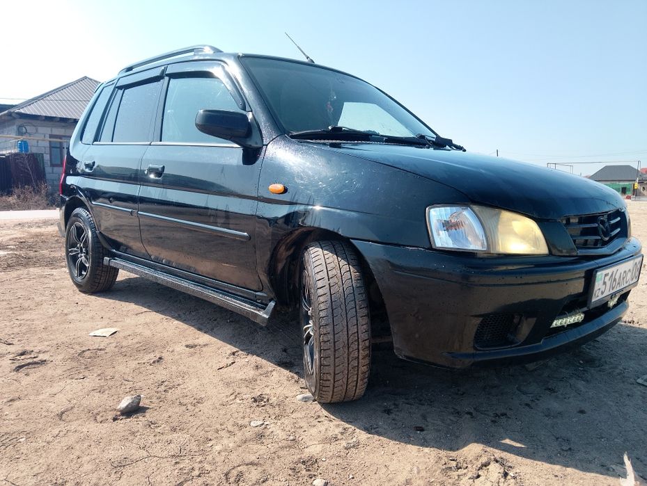 Мазда демио 2003 года