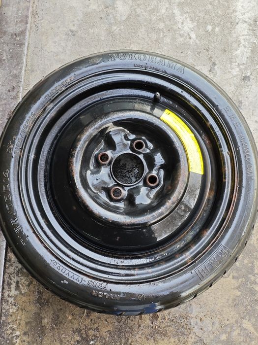 Колесо , докатка , запаска , таблетка .