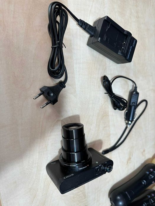 sony dsc-wx500 de culoare negru mat fata spate lateral unghi deschis