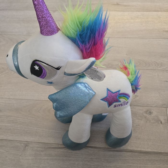 Плюшена играчка еднорог. Нова. 45 см висока.