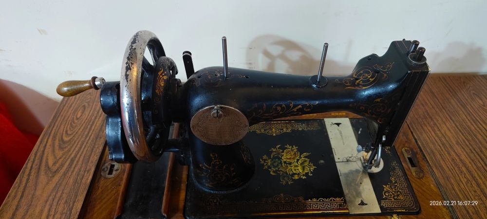 Mașină de cusut Singer