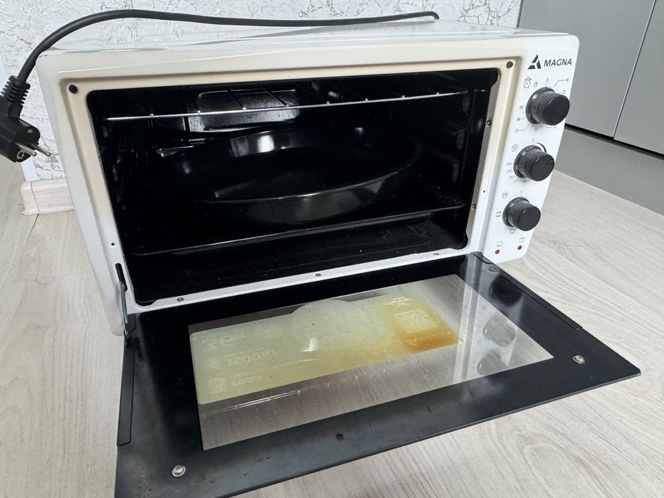 Продам настольную электропечь Magna