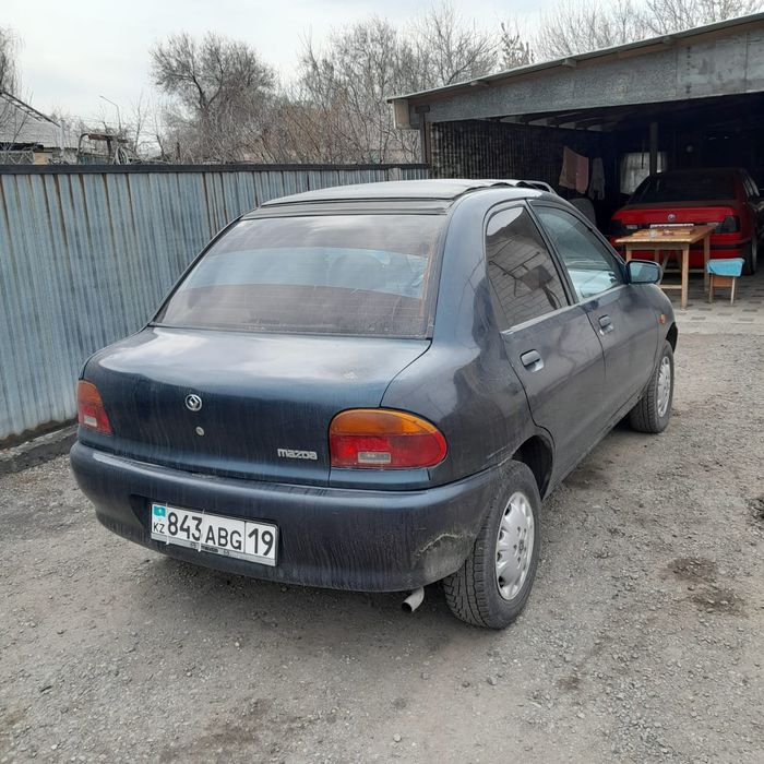 Mazda 121.     .