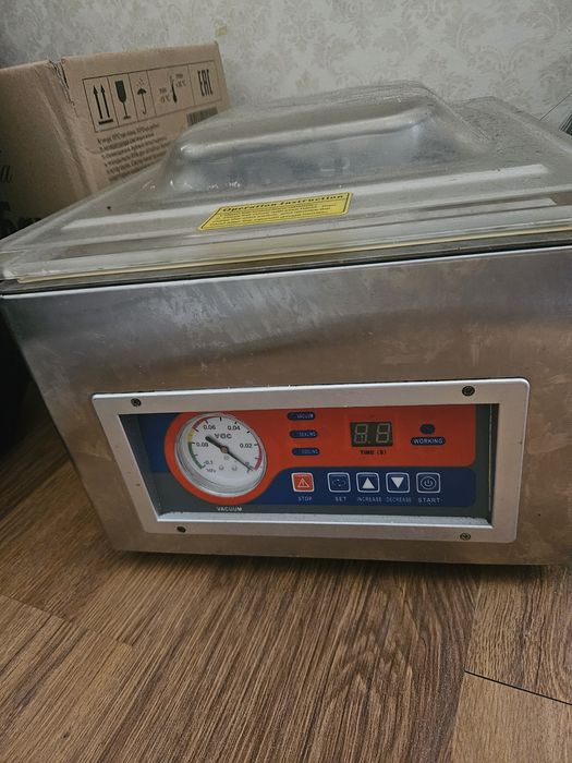 Вакуумный упаковщик