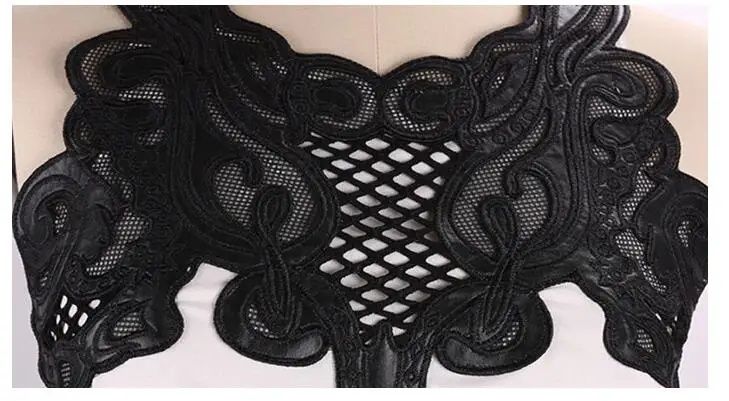 Bluza asimetrica fara mâneci cu broderie 
Potrivită unui S/M/L
Bust: 9