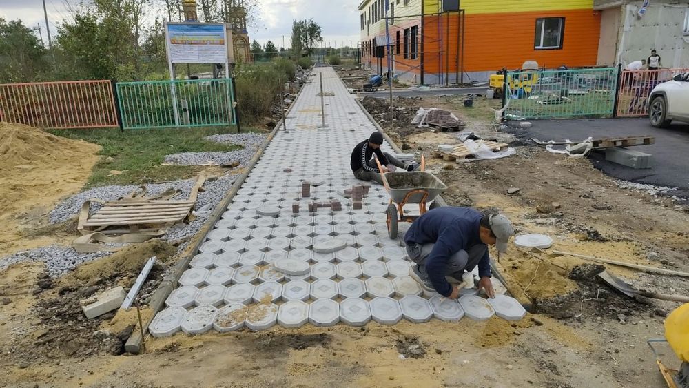 Укладка асфальта брусчатки