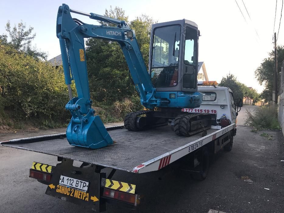 Услуги мини экскаватор .. экскаватор .. трактор ..HITACHI EX30UR-2