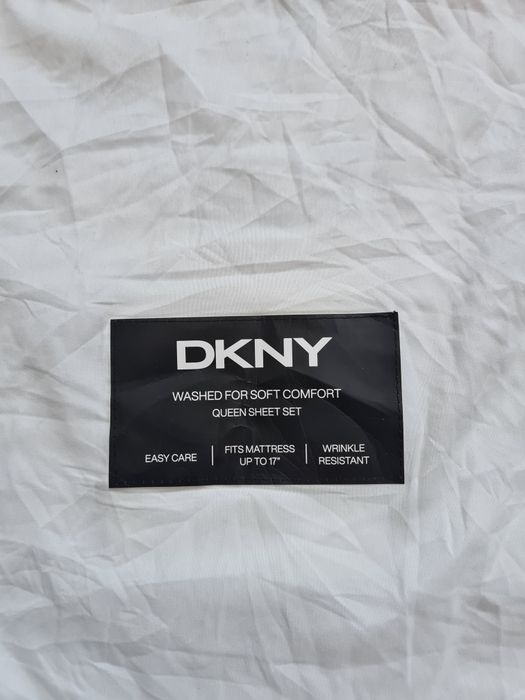 Saci de depozitare genti Guess și DKNY