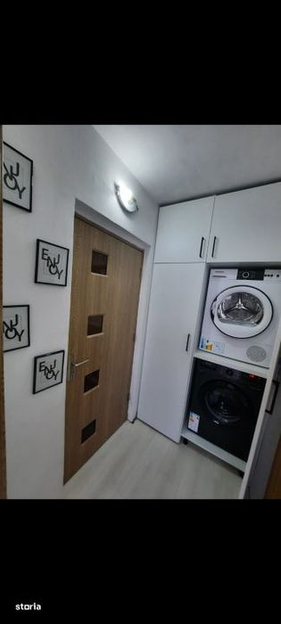 Apartament de 2 camere cu balcon si loc de parcare .