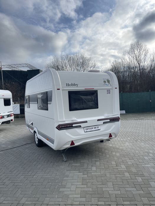 Rulotă nouă premium Hobby OnTour 390Sf pentru 4 persoane