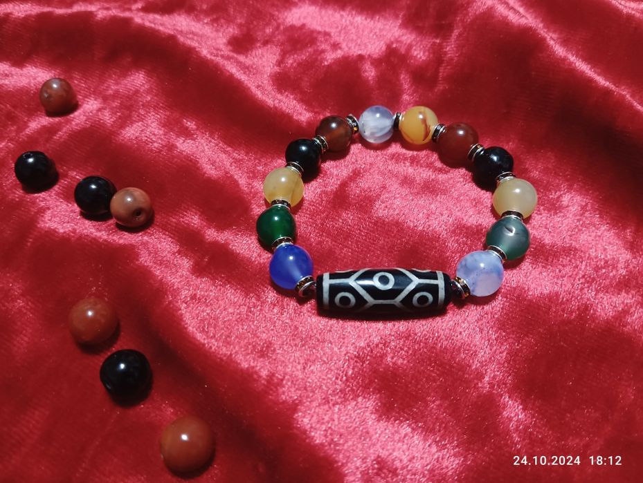 Браслет с бусиной дзи