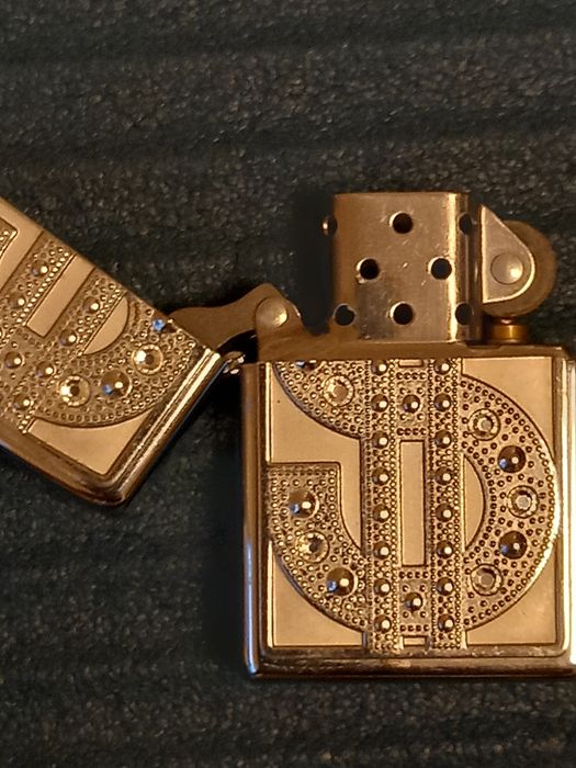 Kолекционерско ZIPPO "Dollar Sign" с камини  (Ян.   2005)  - Made  USA