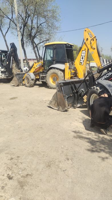 Погрузчик  эксковатор.3в1