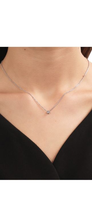 Золотые цепочки и кулоны с бриллиантами