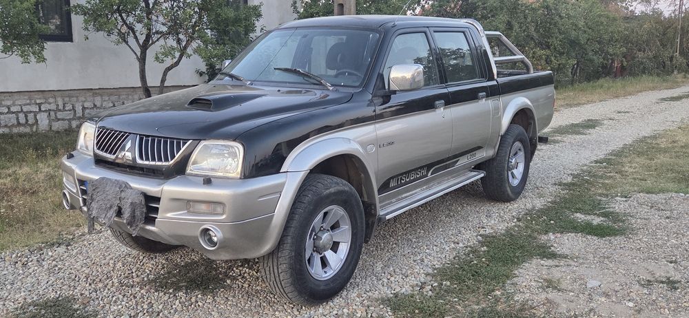 Mitsubishi L 200 climatronic 4x4 cuplaj la mare la mic Diferitial blocabil la buton