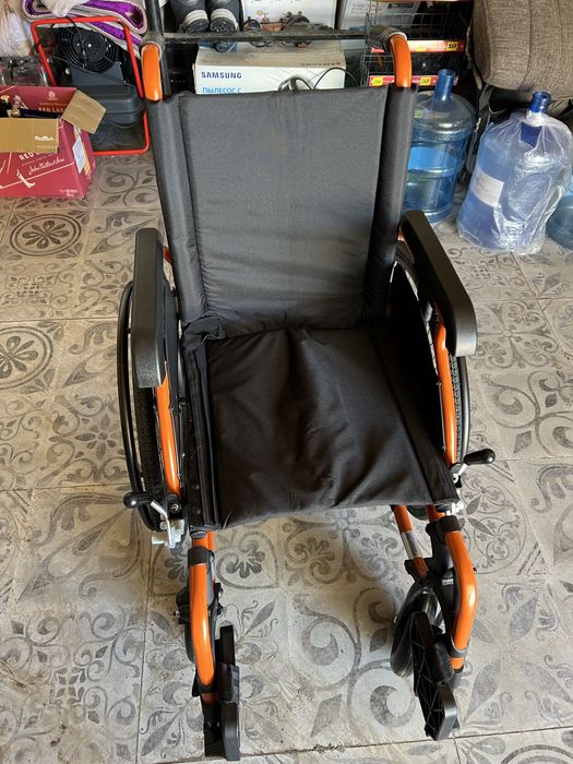 Инвалидная коляска