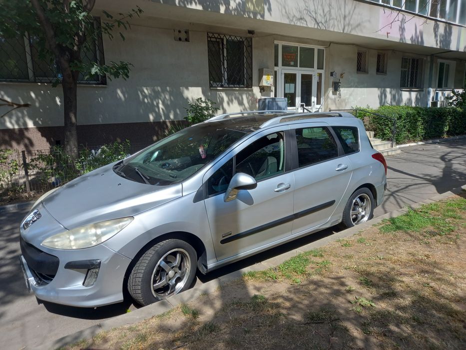 Vindem Peugeot 308 sw Panoramic dublu climatronic 300 mii kilometri